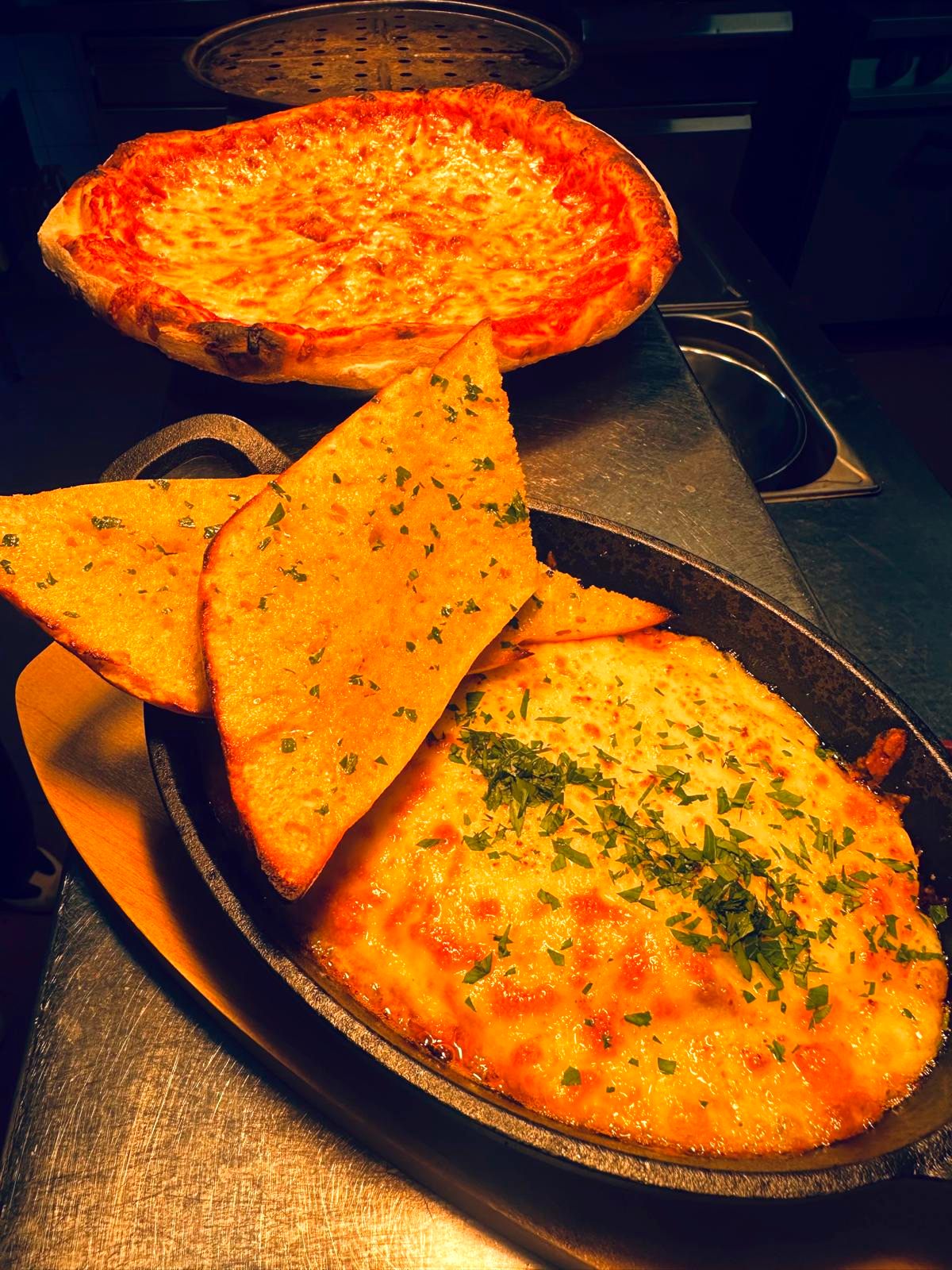 Garlic bread and homemade pizzas